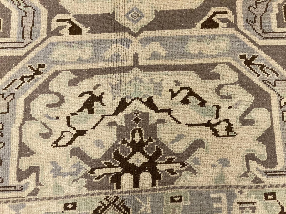 6x9 Ivory and Purple Turkish Tribal Rug