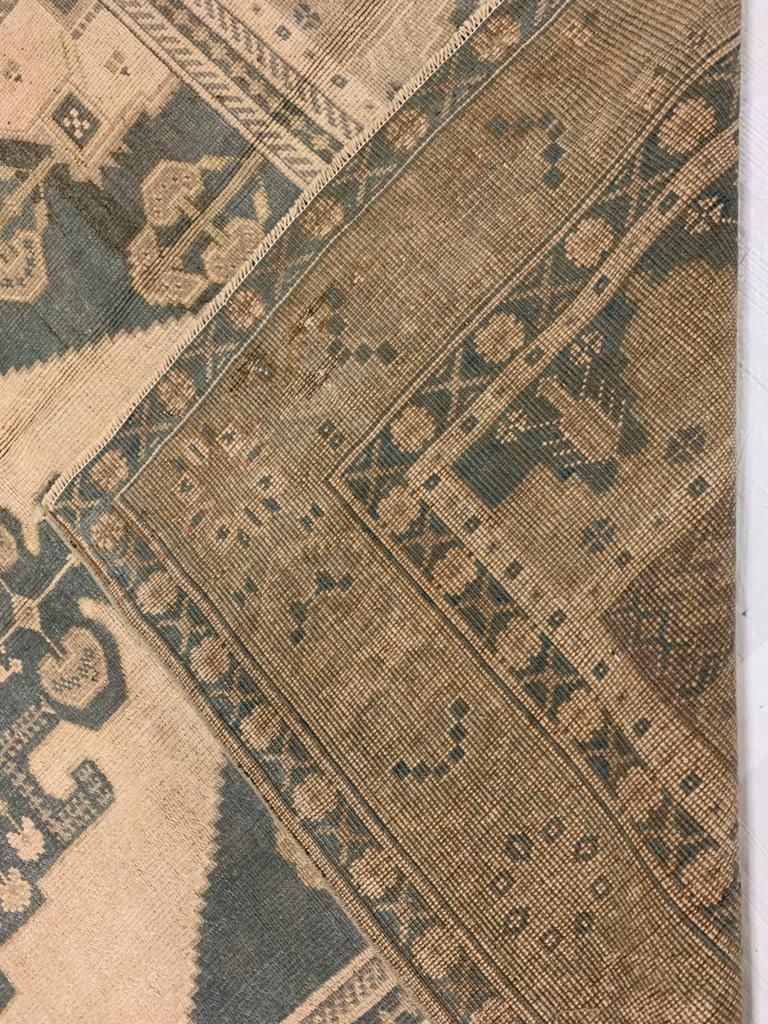5x9 Ivory and Green Turkish Tribal Rug