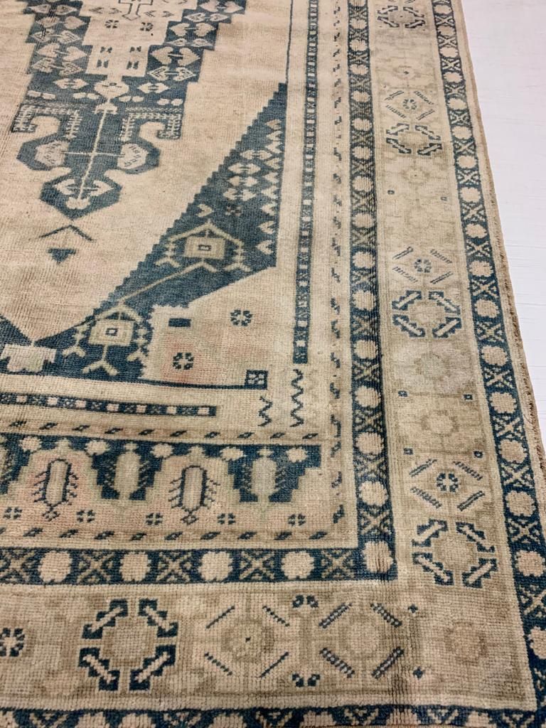 5x9 Ivory and Blue Turkish Tribal Rug
