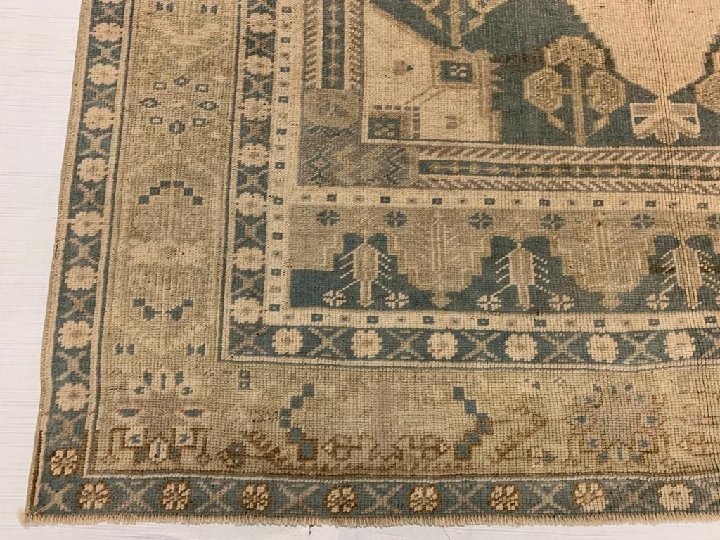 5x9 Ivory and Green Turkish Tribal Rug
