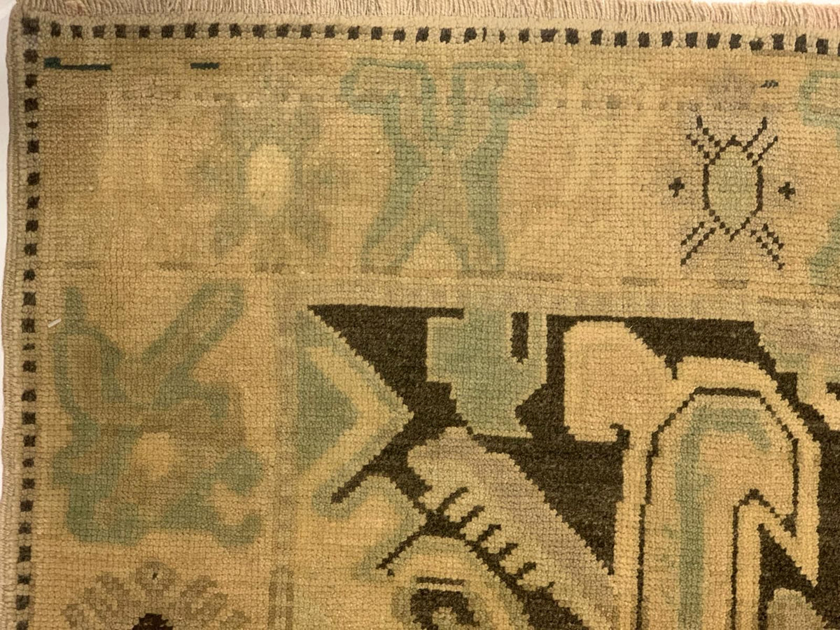 5x9 Ivory and Black Turkish Tribal Rug