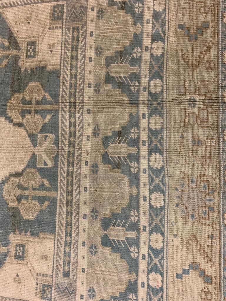 5x9 Ivory and Green Turkish Tribal Rug
