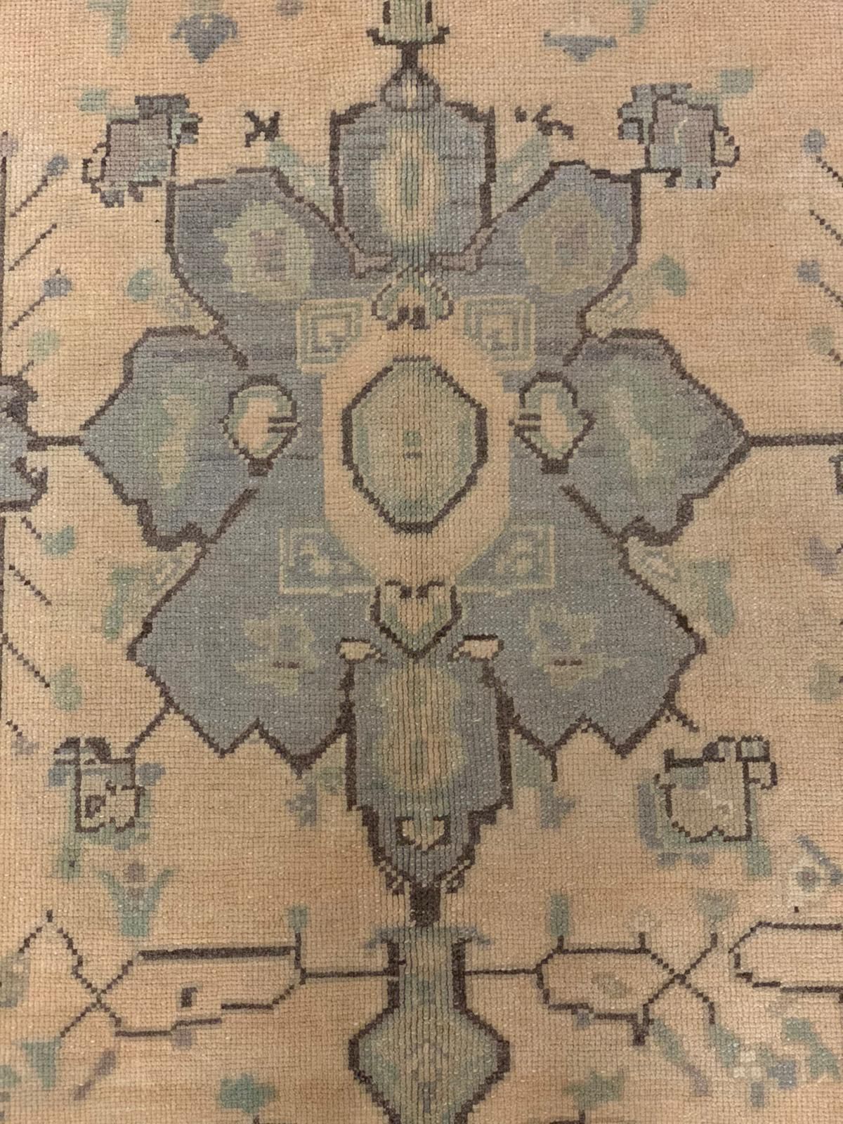 6x9 Ivory and Gold Turkish Tribal Rug