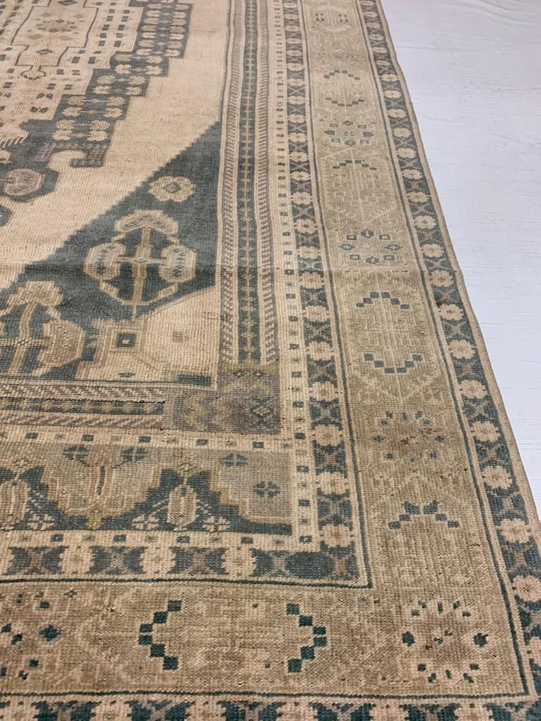5x9 Ivory and Green Turkish Tribal Rug