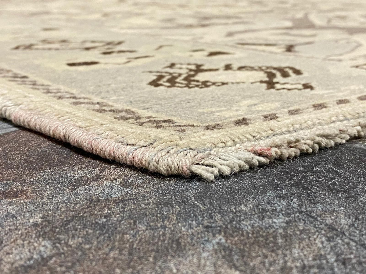 6x9 Ivory and Purple Turkish Tribal Rug