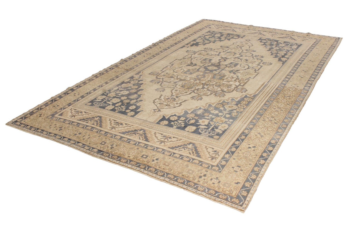 7x11 Ivory and Blue Turkish Tribal Rug