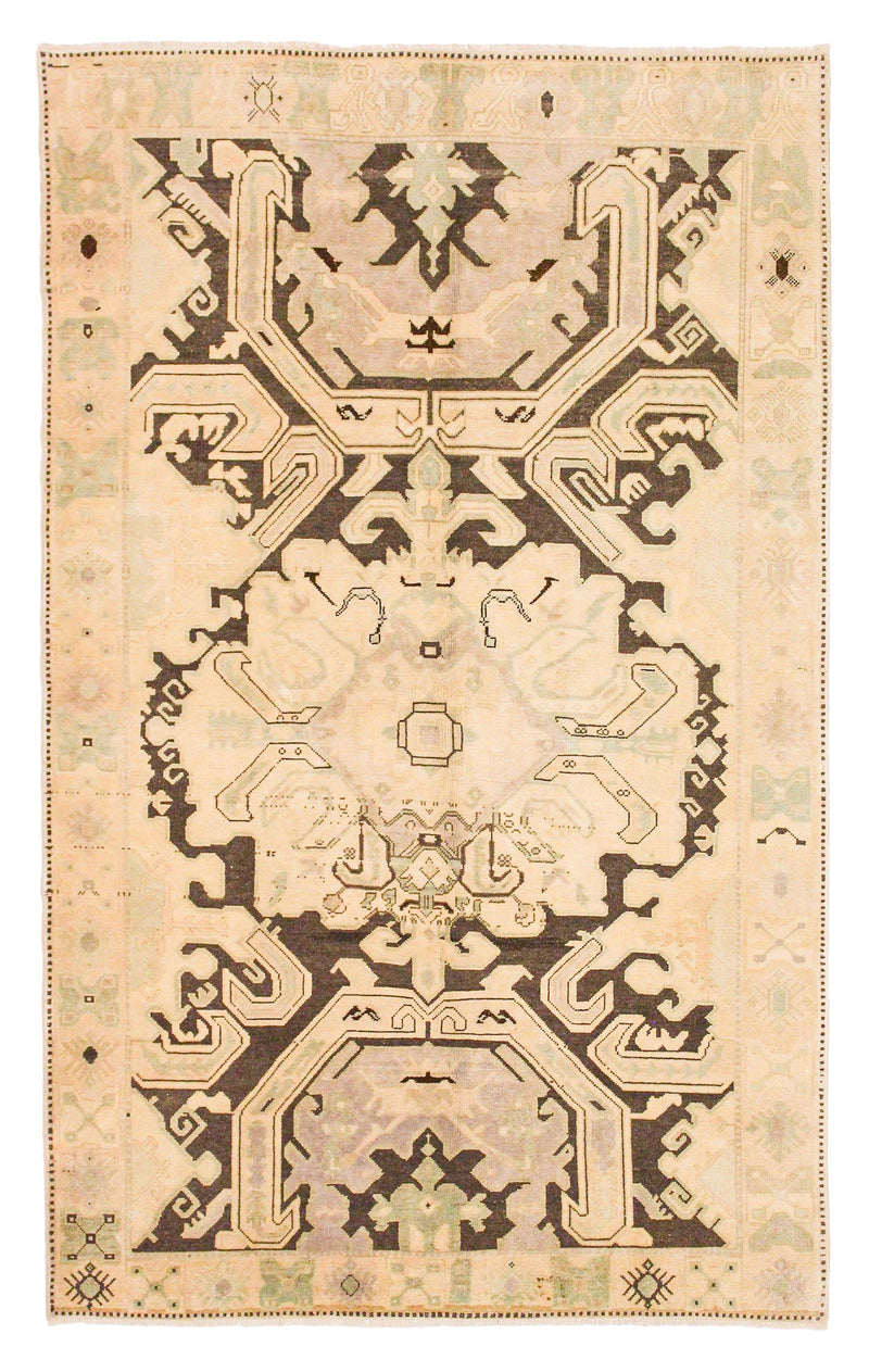 5x9 Ivory and Black Turkish Tribal Rug