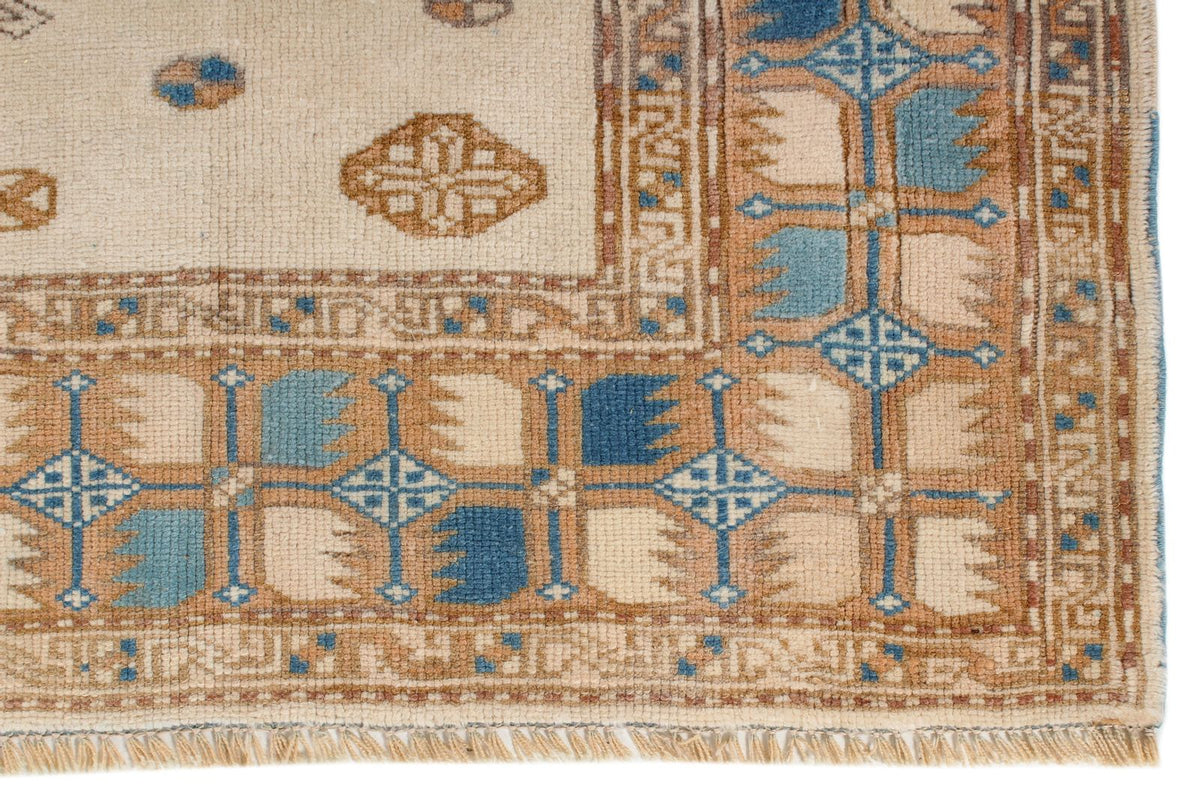 5x7 Beige and Blue Kazak Tribal Rug