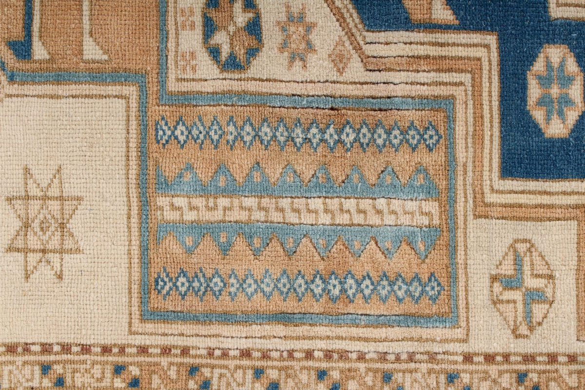 5x7 Beige and Blue Kazak Tribal Rug
