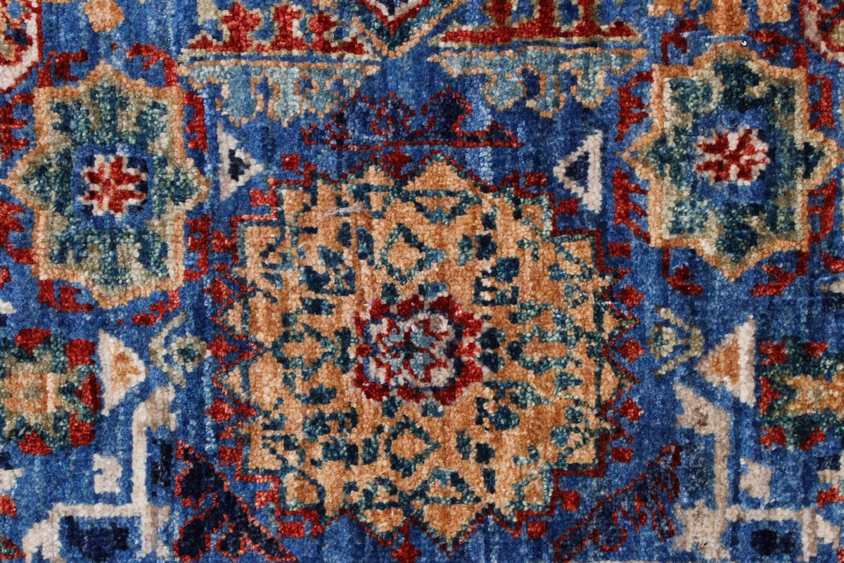 8x10 Ivory and Blue Turkish Tribal Rug