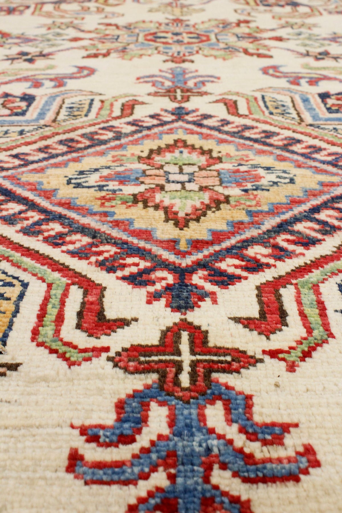 8x10 Ivory and Navy Kazak Tribal Rug