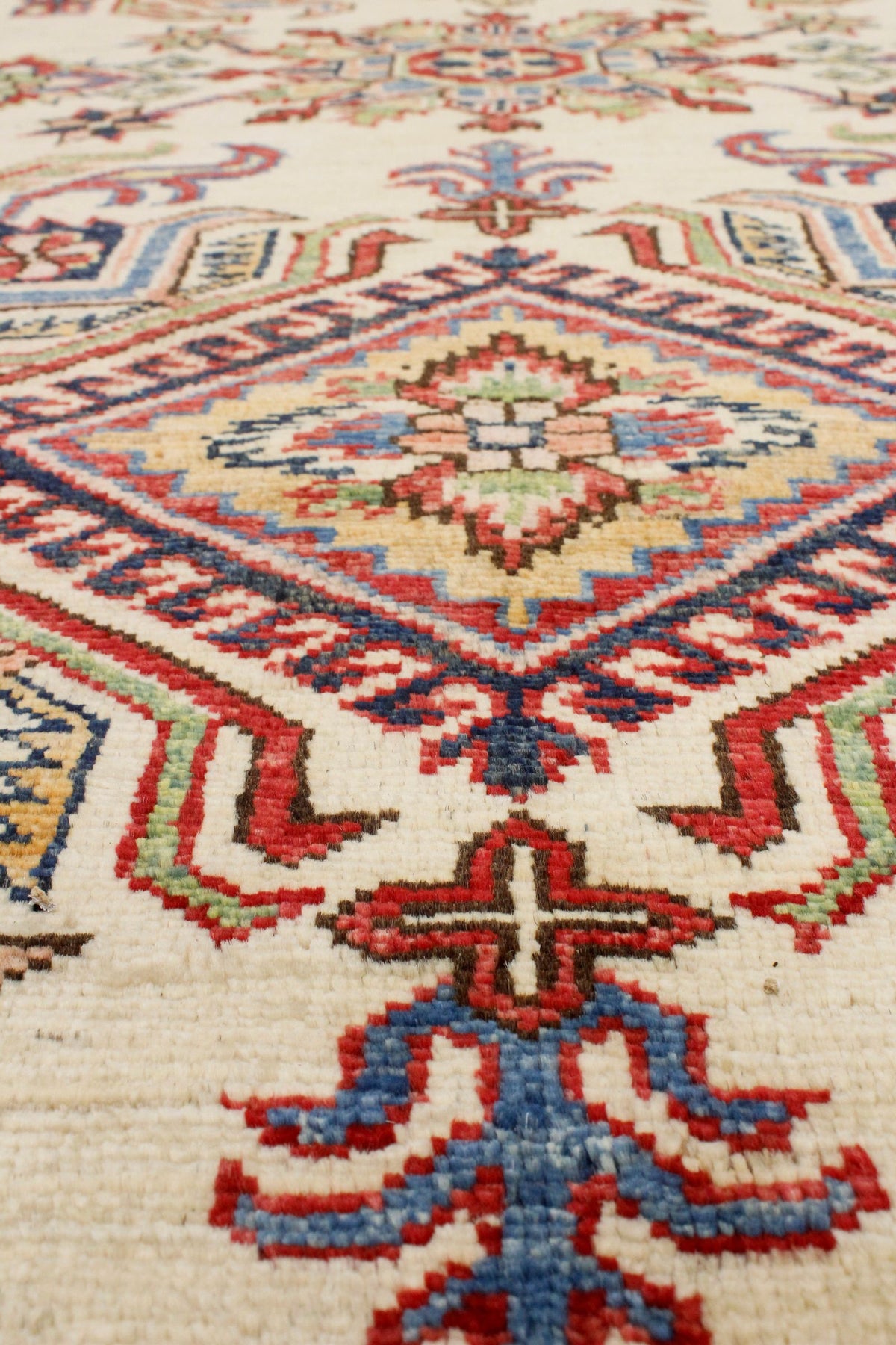 8x10 Ivory and Navy Kazak Tribal Rug