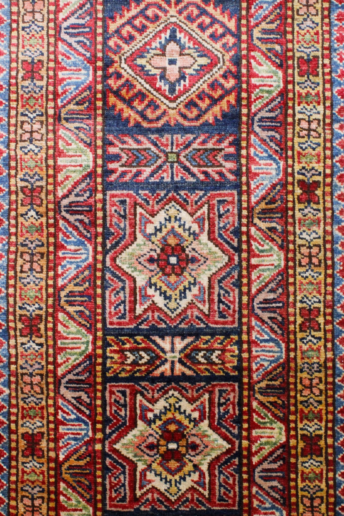 8x10 Ivory and Navy Kazak Tribal Rug