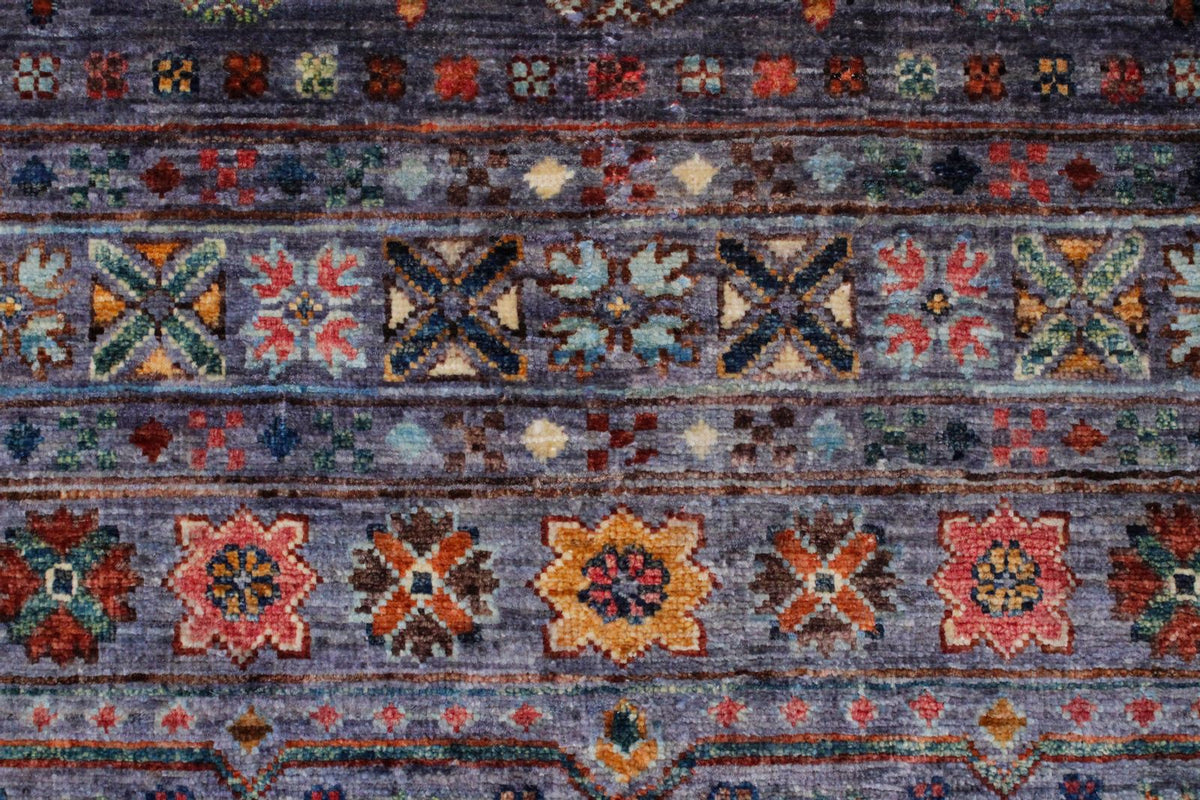 7x10 Gray and Multicolor Tribal Rug
