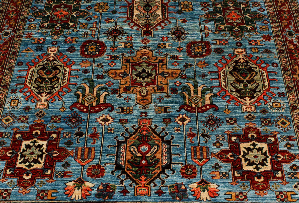 5x8 Light Blue and Light Rust Traditional Rug
