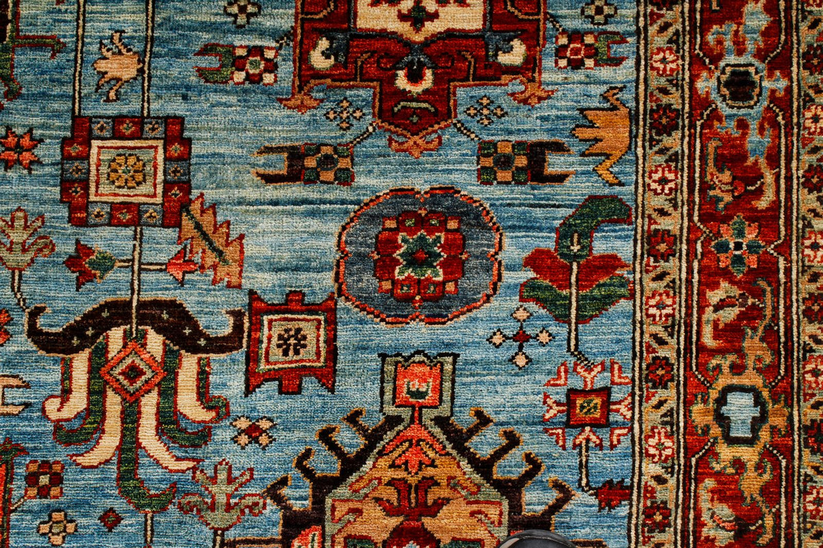 5x8 Light Blue and Light Rust Traditional Rug