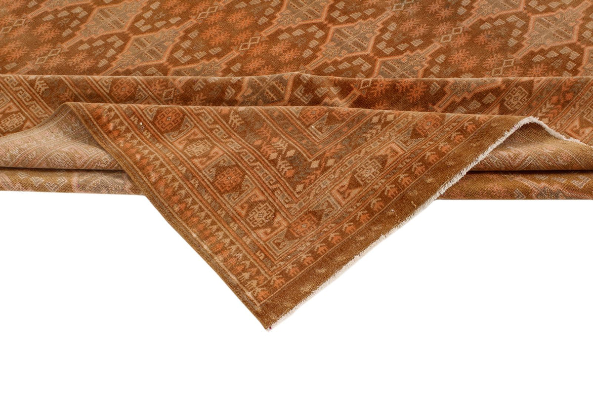 7x10 Brown and Rust Tribal Rug