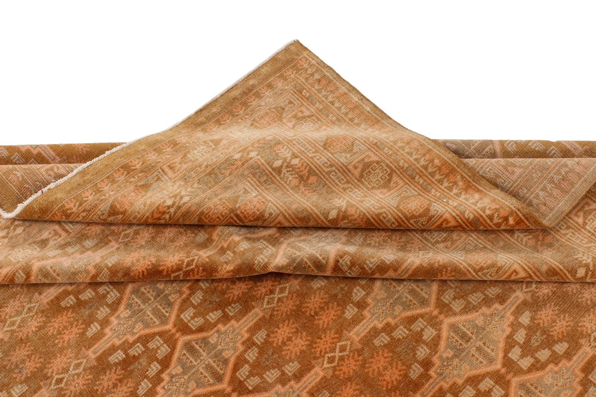 7x10 Brown and Rust Tribal Rug