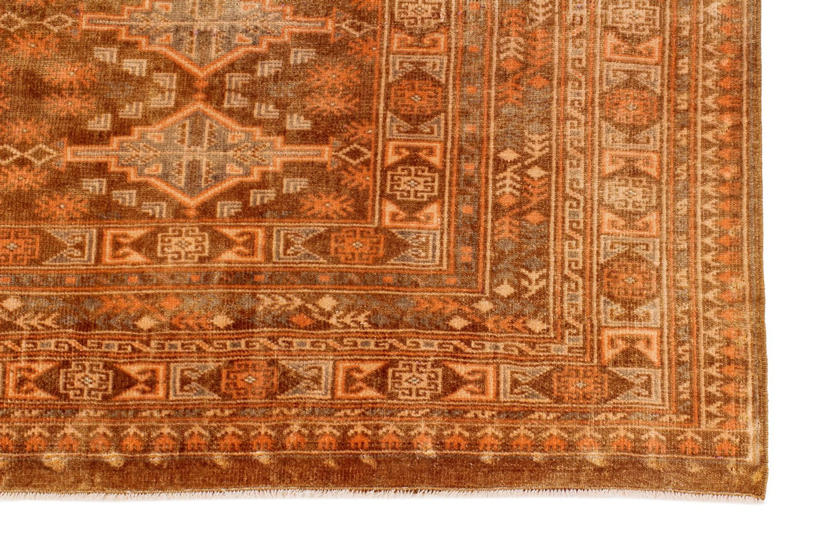 7x10 Brown and Rust Tribal Rug