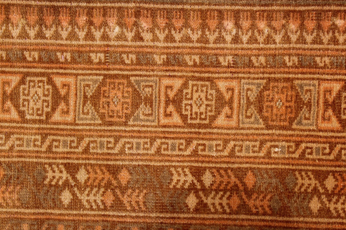 7x10 Brown and Rust Tribal Rug