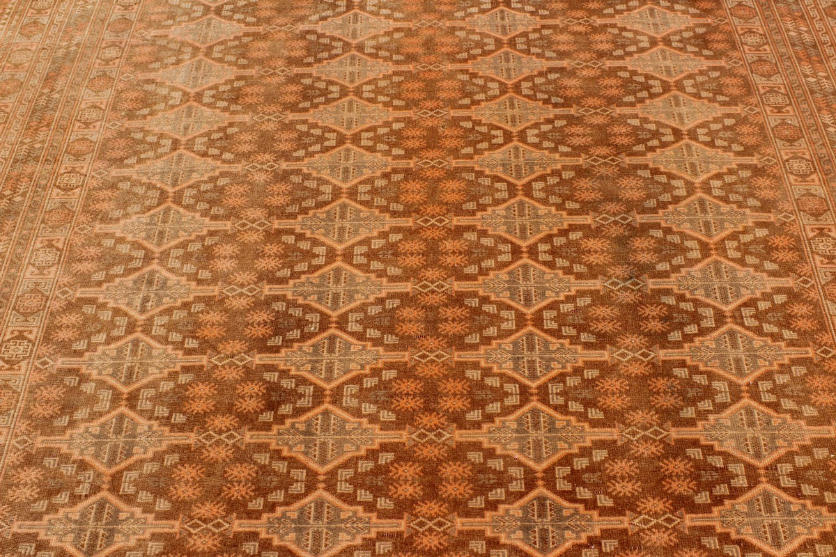 7x10 Brown and Rust Tribal Rug