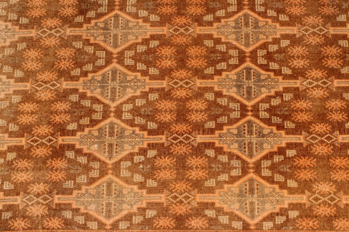 7x10 Brown and Rust Tribal Rug