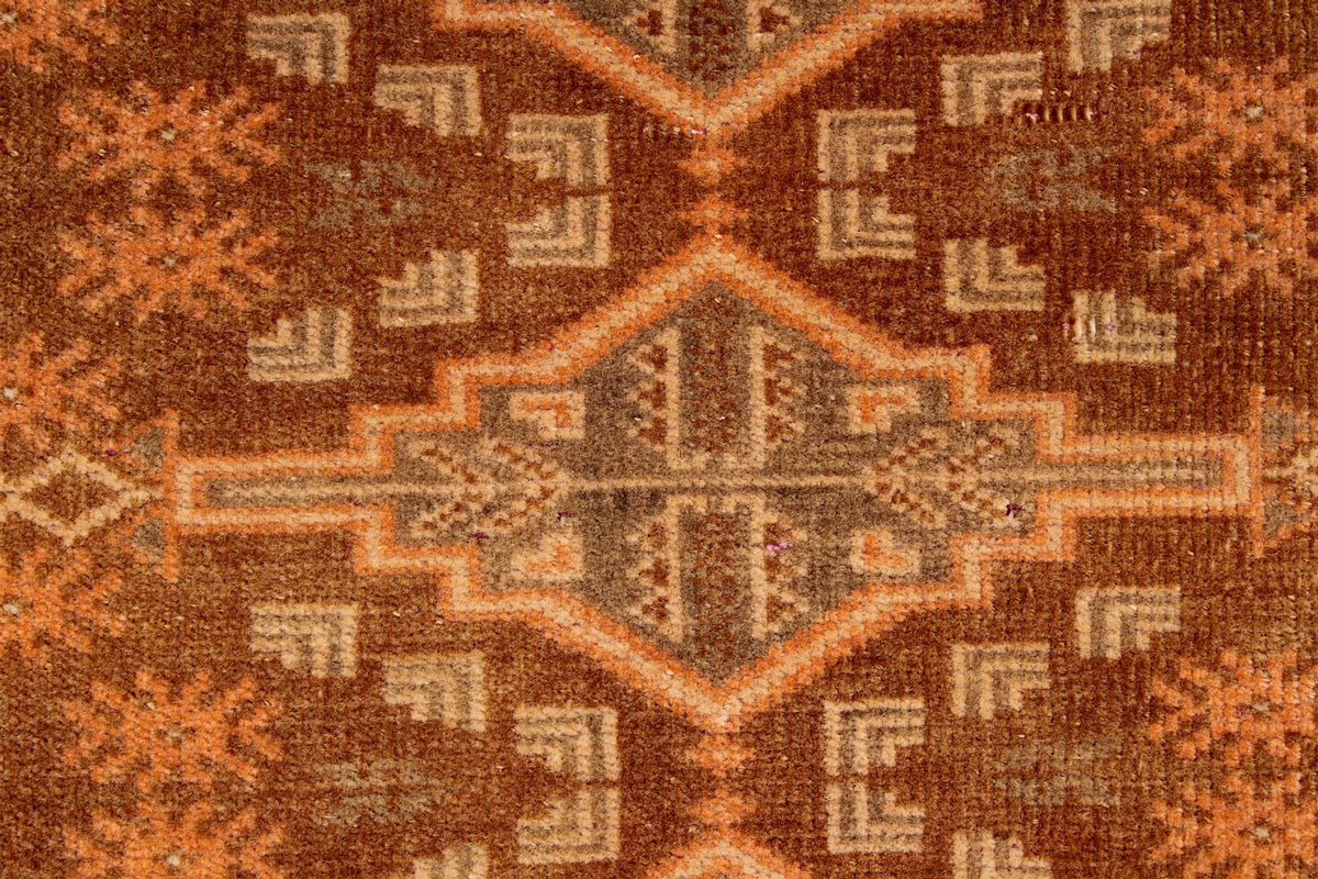 7x10 Brown and Rust Tribal Rug
