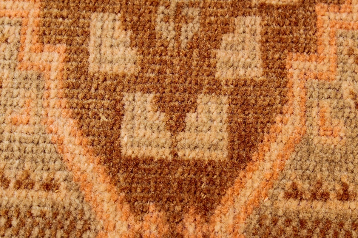 7x10 Brown and Rust Tribal Rug