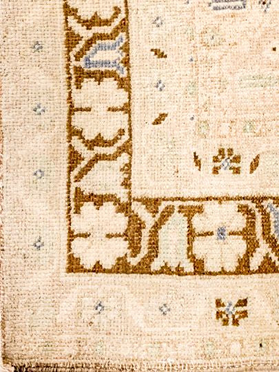 5x9 Ivory and Brown Turkish Tribal Rug